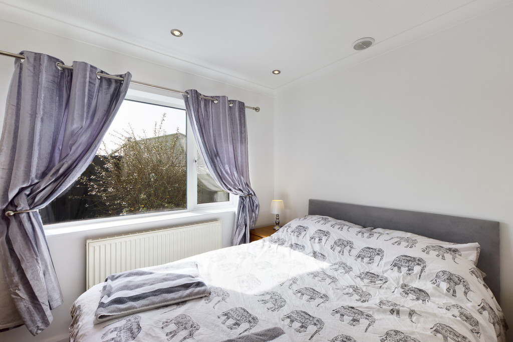 Elegant bedroom at Azy Venture Property